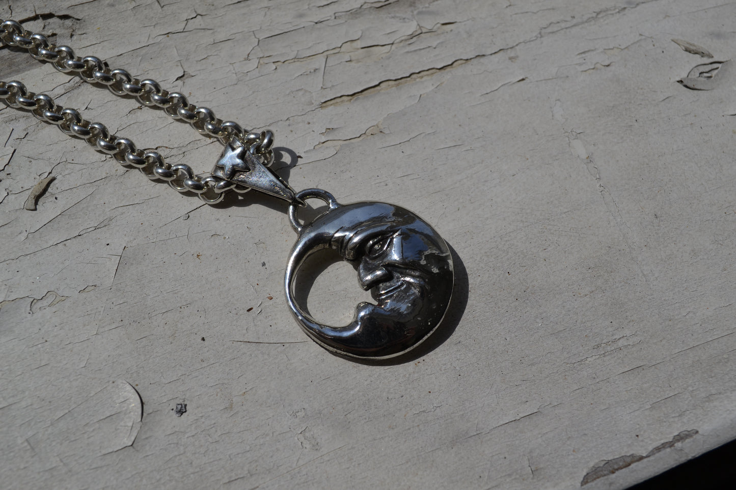 Double Sided Moon Face Pendant