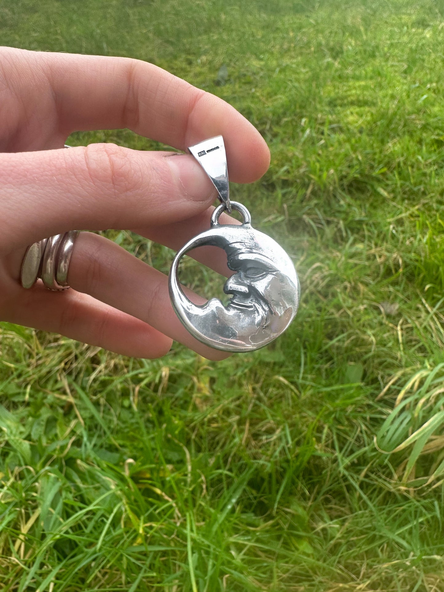 Double Sided Moon Face Pendant