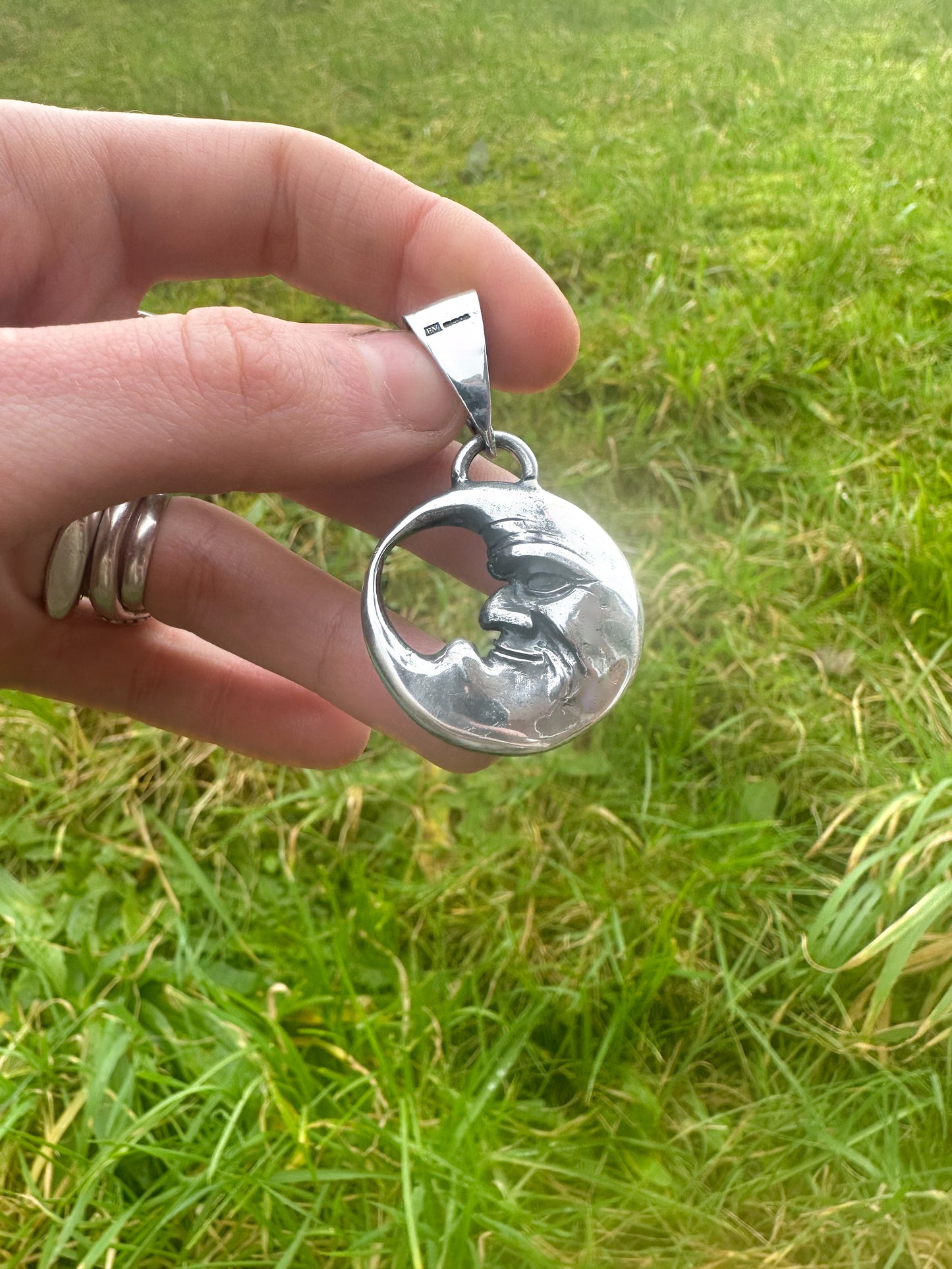 Double Sided Moon Face Pendant