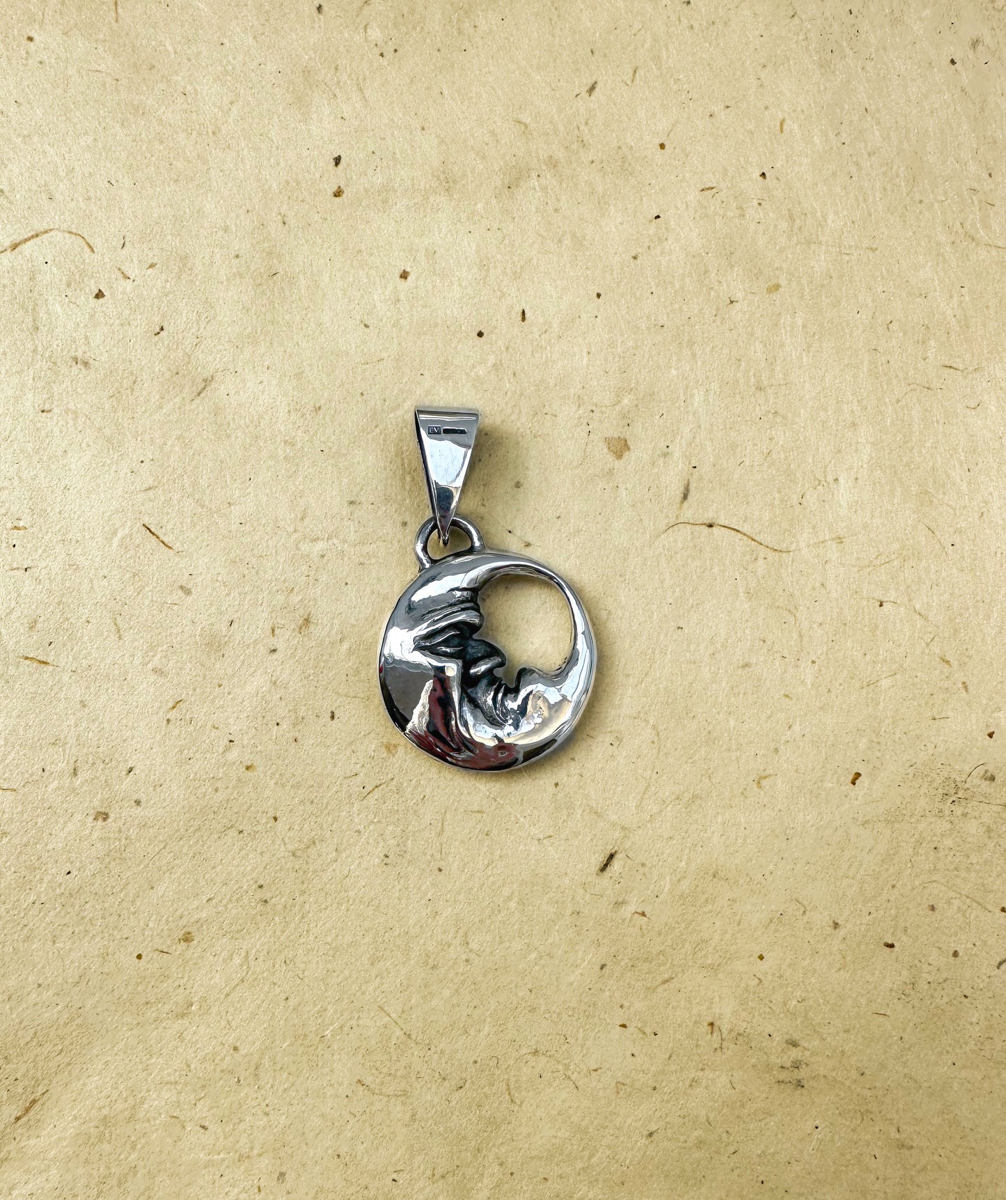 Double Sided Moon Face Pendant