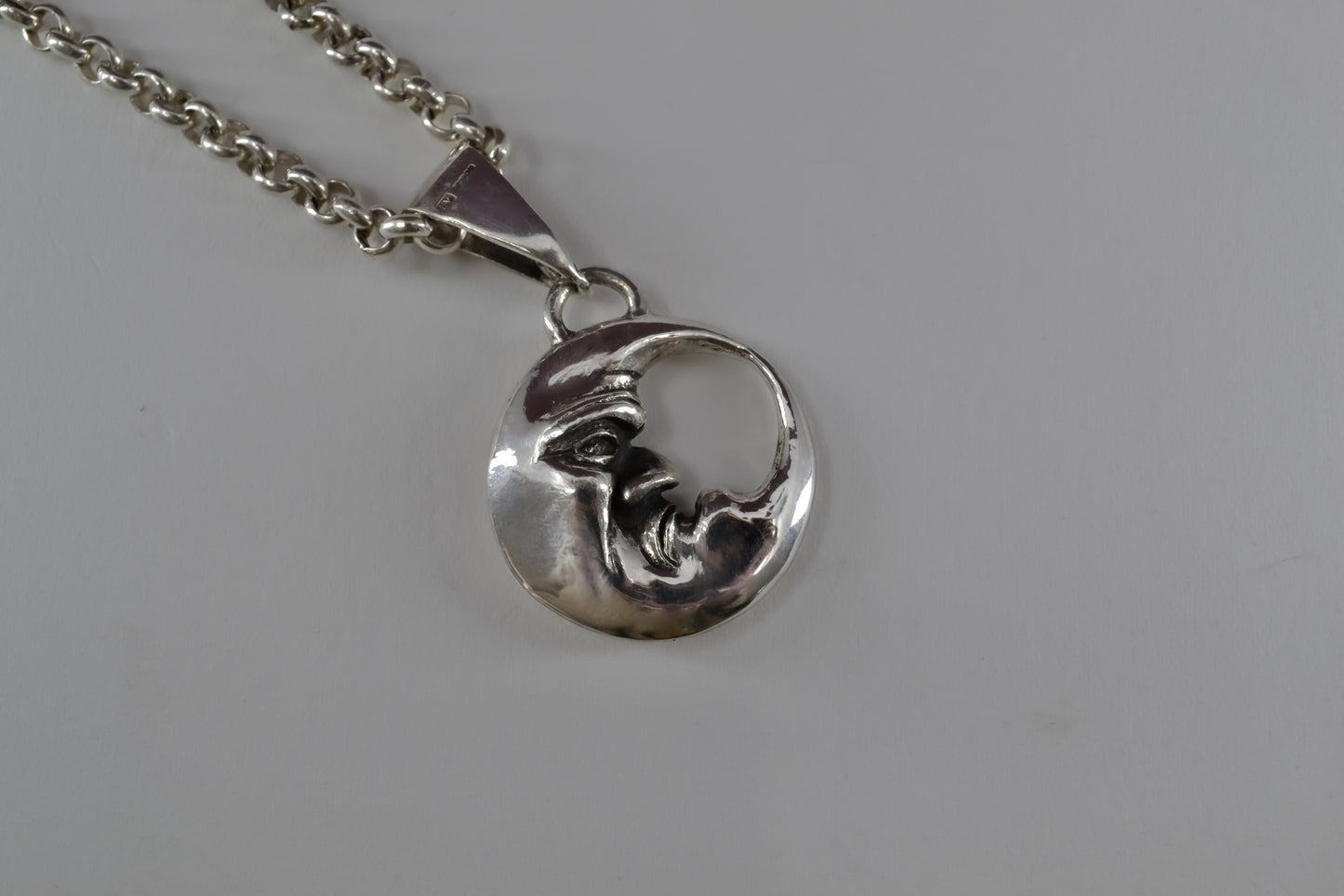 Double Sided Moon Face Pendant