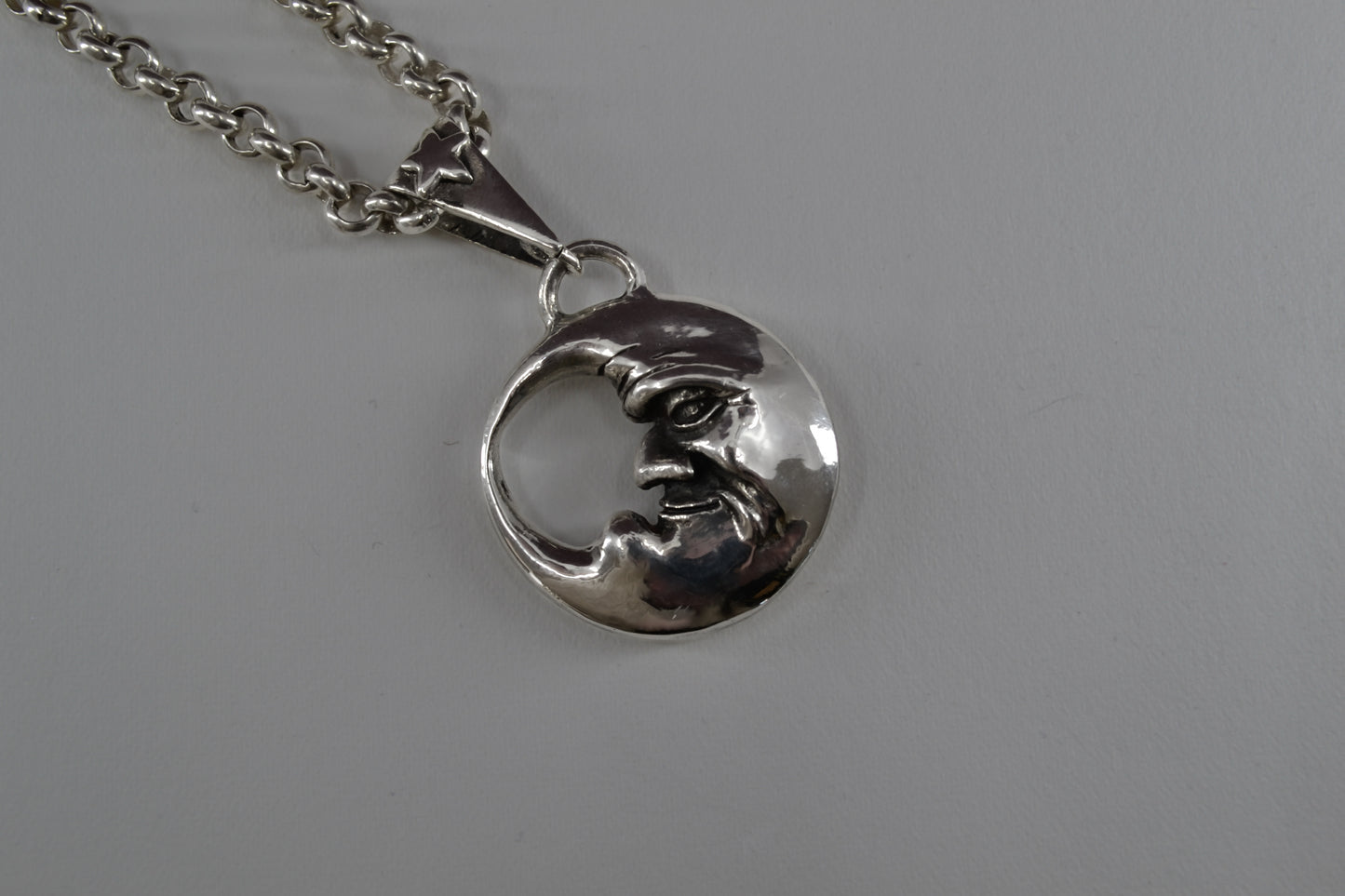Double Sided Moon Face Pendant
