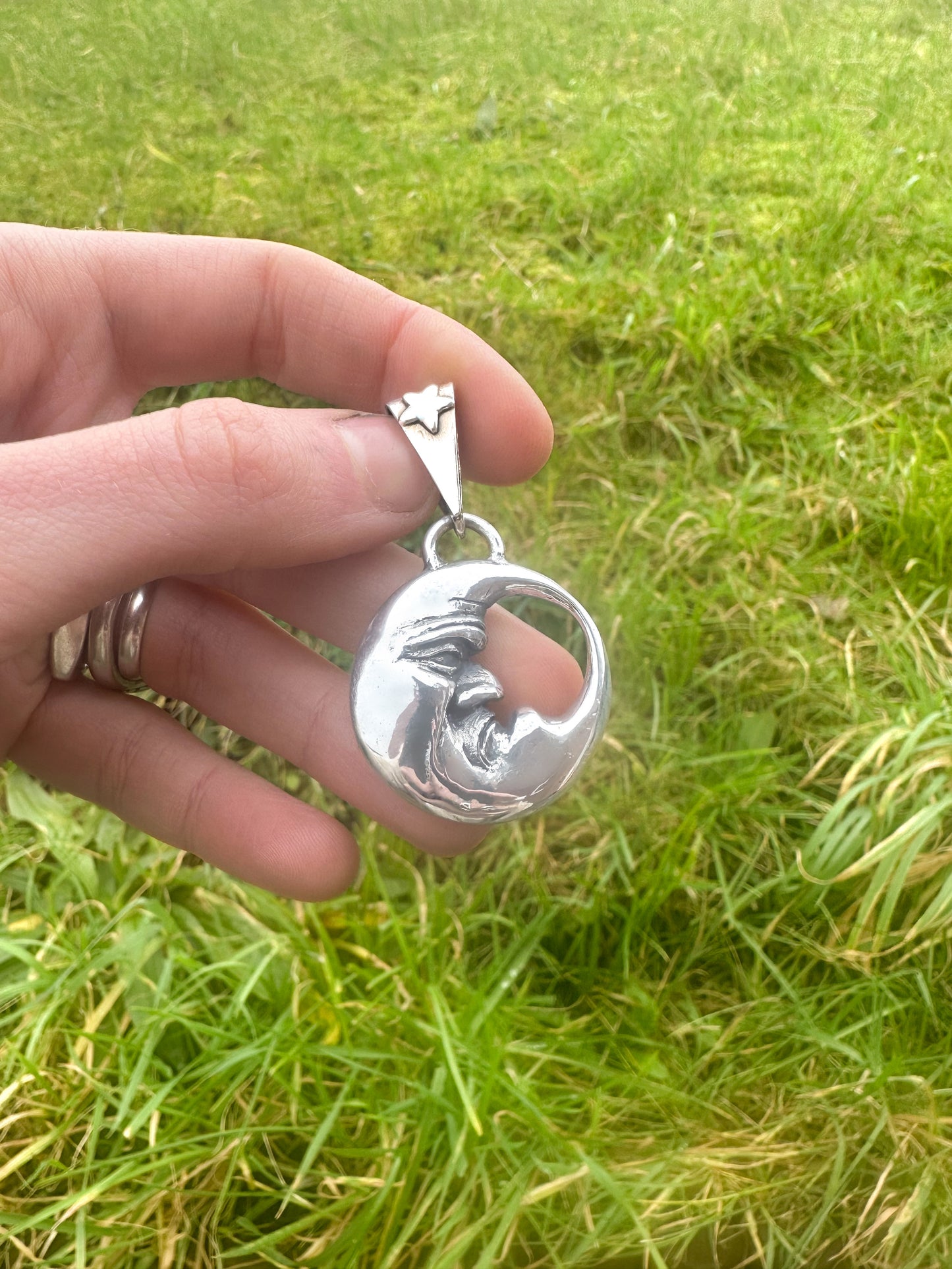 Double Sided Moon Face Pendant